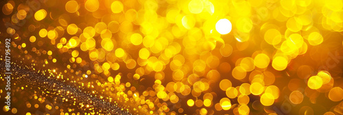 Canary Yellow Glitter Defocused Abstract Twinkly Lights Background, glowing blurred lights with vibrant canary yellow hues.