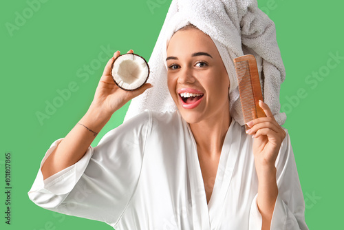 Happy young woman with coco...