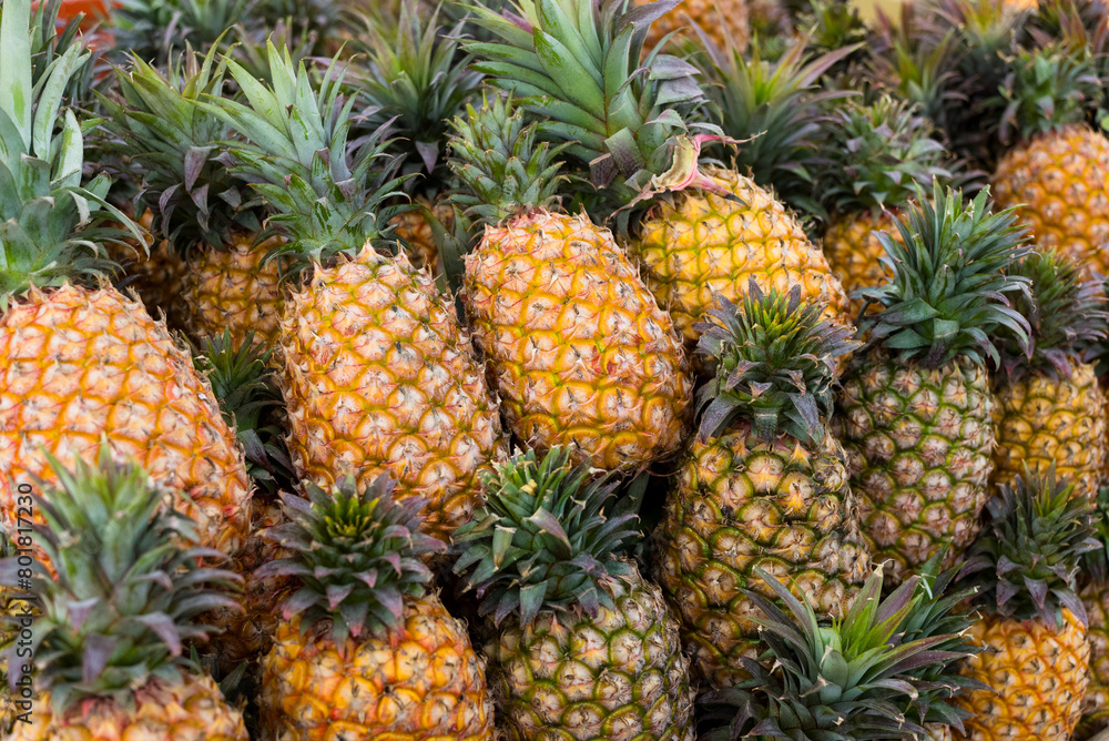 Pineapple sell in the fruit store in the market Pineapple sell in the fruit store in the market