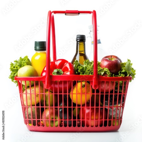 red plastic shopping basket, rectangular, filled with milk, olive oil, peppers, salad, apples, oranges, flour, on a white background