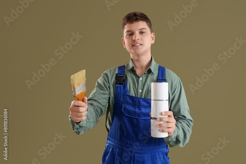 Teenage decorator with brus...