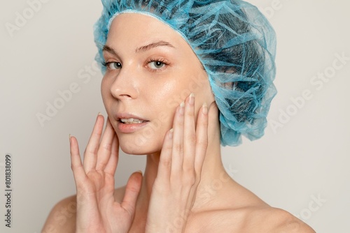 Woman getting plastic surgery at beauty clinic