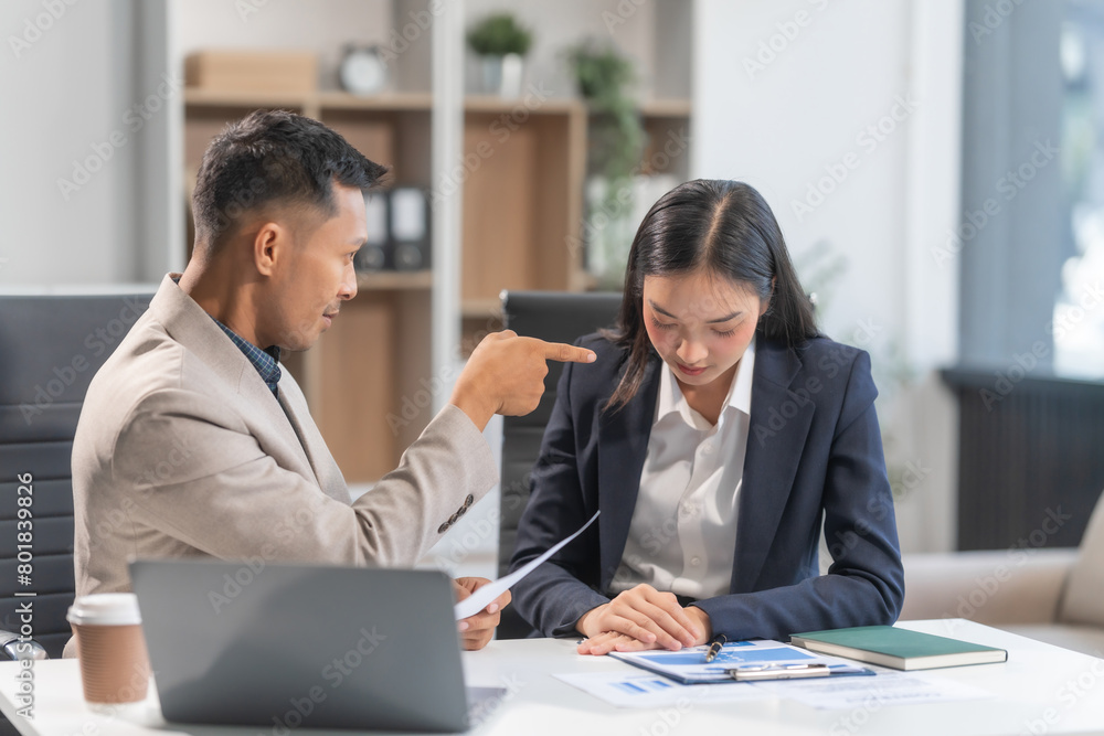 Fototapeta premium Asian businesswoman and businessman facing workplace challenges. From age diversity to handling mistakes and consequences like bankruptcy, emphasizing accountability, and learning from errors.