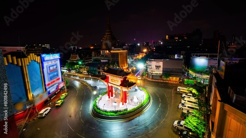 Time lapse Odeon Circle and Chinese gate. Chinatown, Bangkok.
beautiful lighting in the night.   
long exposure at the Odeon circle the Gate of China town at Yaowarat road.