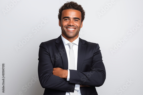 a portrait of a multiracial businessman in a suit on an isolated white background