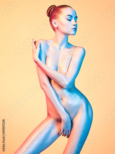 Beautiful figure of a nude model. Sexy lady.