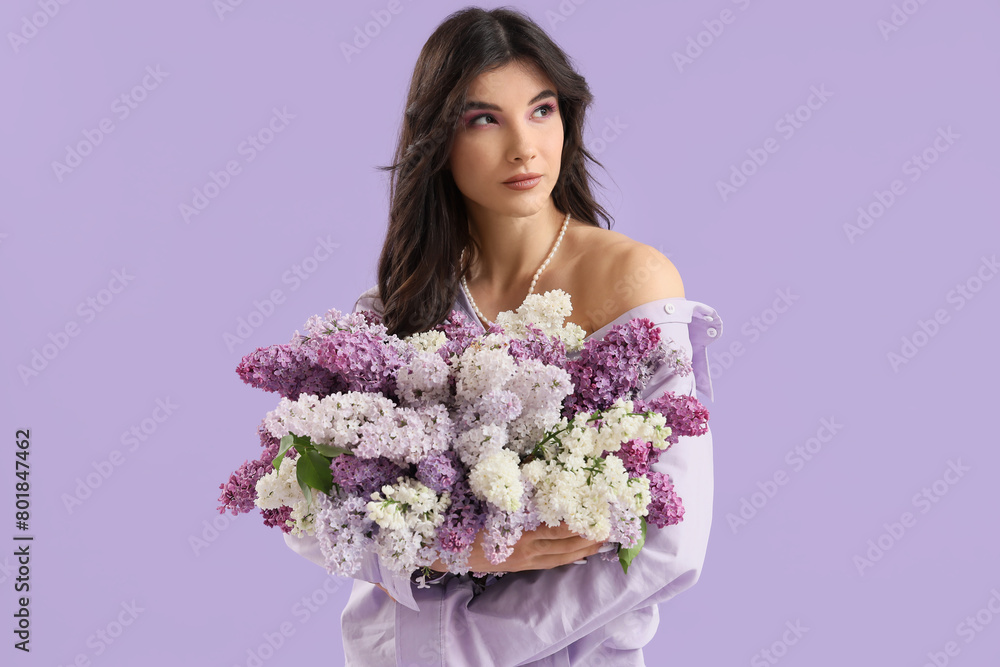 Beautiful young woman with lilac flowers on color background Beautiful young woman with lilac flowers on color background