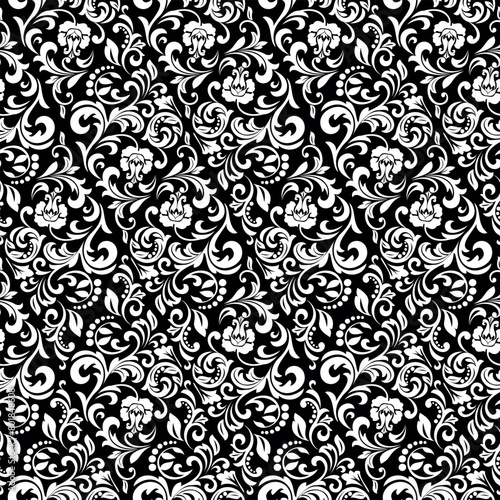 Wallpaper in the style of Baroque. Seamless vector background. White and black floral ornament. Graphic pattern for fabric, wallpaper, packaging. Ornate Damask flower ornament.
