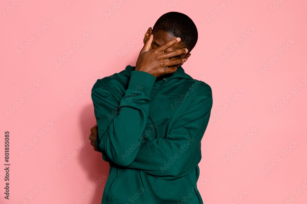 Man facepalm, shy person on pink background Man facepalm, shy person on pink background