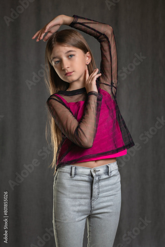 Studio portrait of a young beautiful long-haired girl.