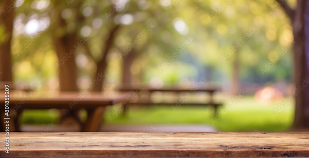 Wooden table and blurred green nature garden background, Empty wooden table top blur bokeh Background Ready for product Display Wooden table and blurred green nature garden background, Empty wooden table top blur bokeh Background Ready for product Display