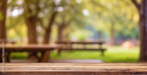 Wooden table and blurred green nature garden background, Empty  wooden table top  blur bokeh Background Ready for product Display © HAPIXEL
