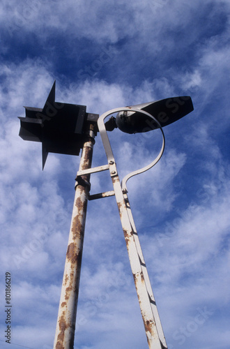 vertical image. Railway safety lights on double poles. Location Woodbridge Railway station Suffolk UK 2003