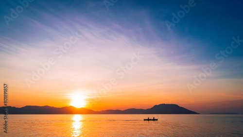 Golden sunset at sea. Bonbon Beach, Romblon Island, Philippines