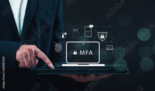 Fotografie Multiple factor authentication MFA method using portable devices to protect data and account on internet data security concept, businessman using tablet with secure computer technology graphics icon