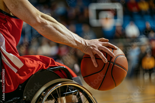 Wheelchair Basketball Player Wearing Red Uniform Leads Ball Successfully to Score a Perfect Goal  © Fabio