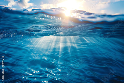 Sunlight shining ,the surface and under the blue ocean, sea wave , with clean waters in summer time
 photo