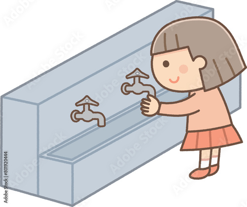 手洗い場で手を洗う女の子