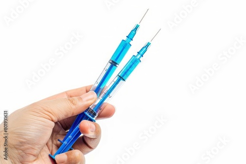 Doctor's hand holding syringe of medicine vaccine for cure the disease sickness ill on a white background.