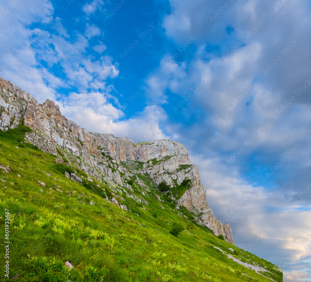 green mountain valley under a blue cloudy sky green mountain valley under a blue cloudy sky