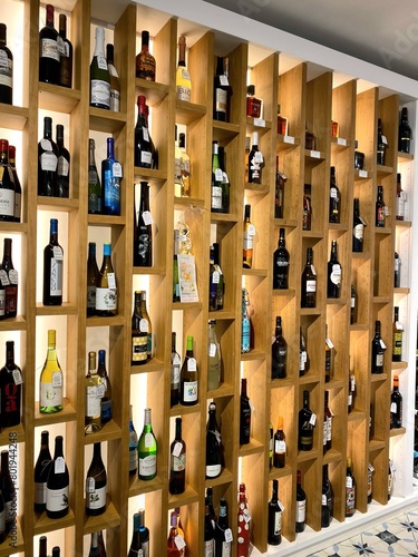 Modern wine rack in busy night club bar