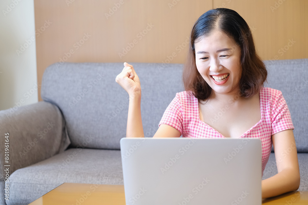 Asia woman playing or working with laptop, work form home Asia woman playing or working with laptop, work form home