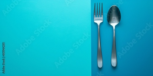 The background is completely mix Blue and Silver with no texture and the Spoon and Fork is in the right hand side photo