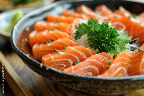 Ceramic black bowl with delicious red salmon