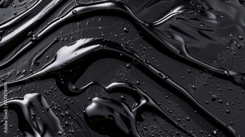 A black liquid with a shiny, wet appearance