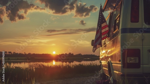 A serene image of the American flag at sunset, draped over a camper van, capturing the essence of a peaceful journey through America's heartland, isolated photo