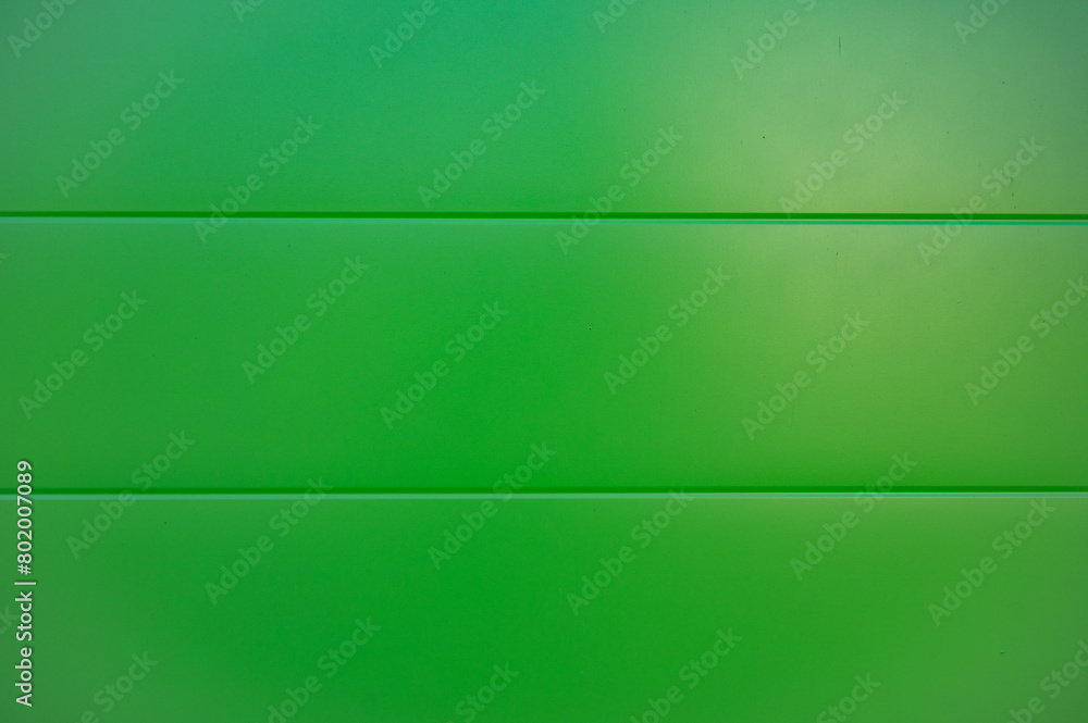 Green flat background of plastic planks.