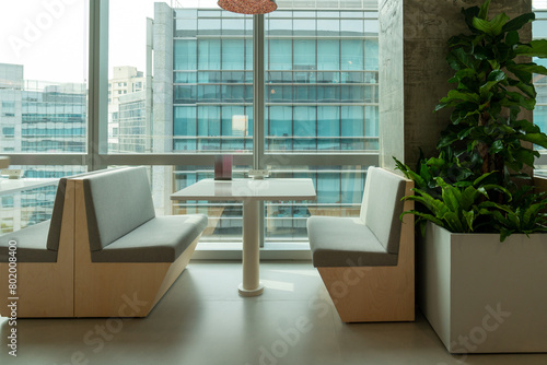 Interior of modern empty office building.Open ceiling design.Equipped with automatic lifting table and LCD screen.