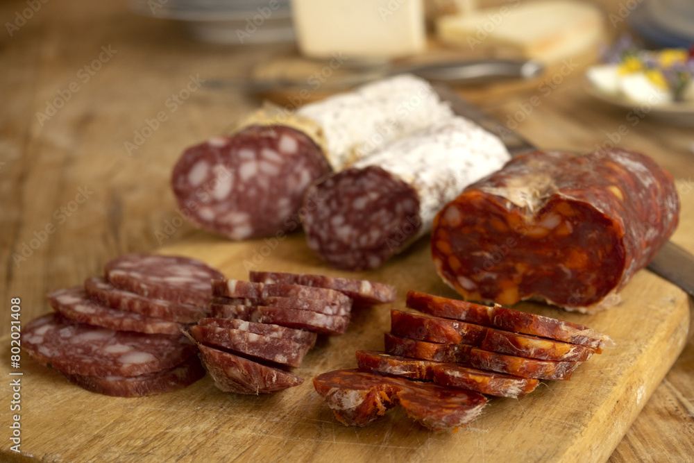chopping board of various salamis chopping board of various salamis