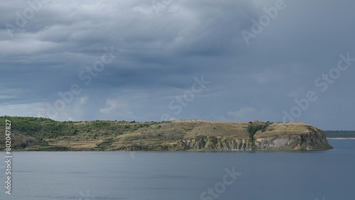 Rocky shoreline near Razanac, Northern Dalmatia, Croatia during august cloudy afternoon. 