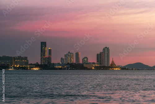 View of Pattaya city. Pattaya is a city next to the sea and famous places in Thailand that foreigners come to visit and travel for vacations. © Pornprasit Panada