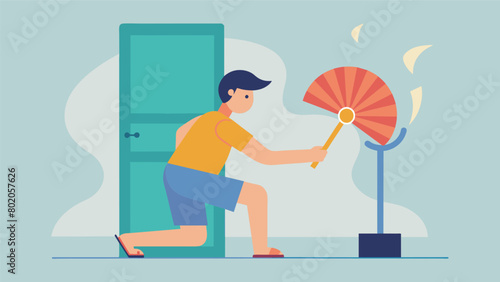 A person using a handheld fan to cool themselves down rather than opening the sauna door and letting out precious heat.. photo