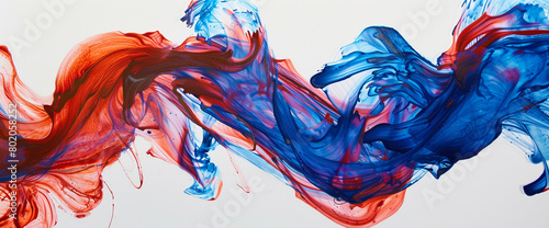 Flowing ribbons of electric blue and fiery red merging together on a pristine white surface, creating an abstract display of movement and energy.