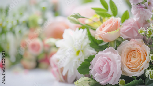 beautiful fresh spring flowers of delicate colors on a white table