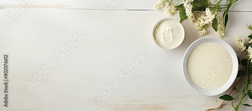 Bowl of cream and flowers