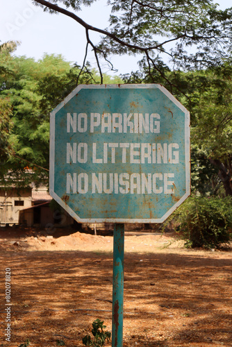 'No parking, no litterling, no nuisance' sign located in park