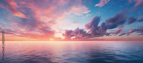 Majestic sunset over ocean with clouds