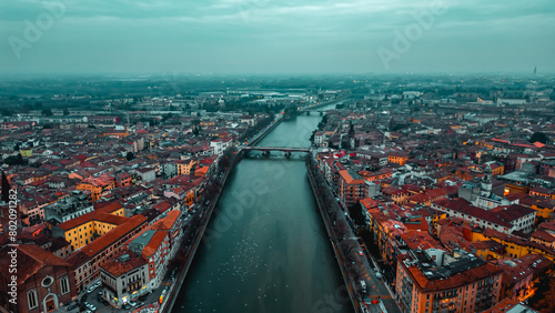 City of Verona and Adige river aerial view Veneto region, Italia. Red tiled roofs. Traditional Italian architecture photo