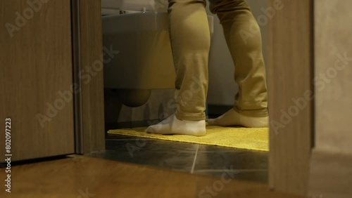 Prostate adenoma in humans. Urinary tract disease. Man near the toilet in pain. A man has problems with the genitourinary system and frequent urination