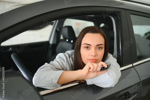 woman customer female buyer client chooses auto. Sales concept © Serhii