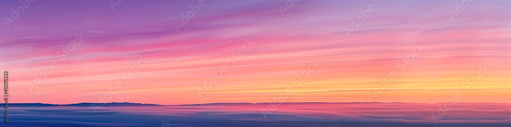 Marvel at the ethereal beauty of a sunrise gradient, where the sky is painted in a spectrum of colors, from soft pastels to rich, deep tones, offering an inspiring backdrop for artistic endeavors.