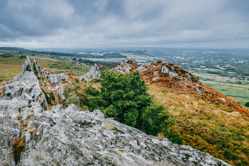 Mountains of Brittany. Beautiful panorama from the highest rocky point of Brittany over moors and hills. Roch Trevezel, Monts d'Arrée massif, France