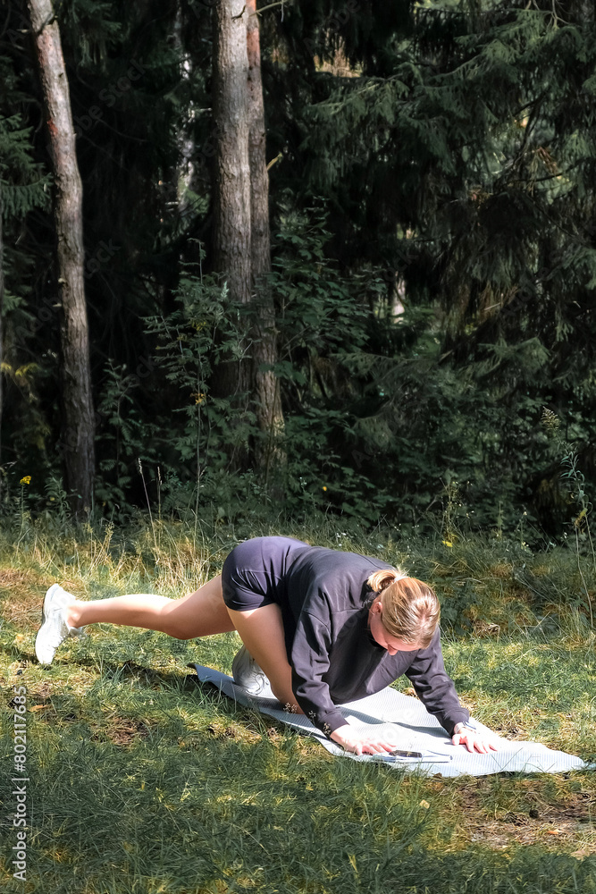 sports workout outdoor.Fit,Retreat,wellness.Woman exercising outdoors forest.Health, nature, fitness, yoga,eco fit.mental health.Wellness, exercise, physical health,gym nature