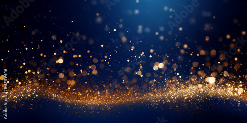 Golden abstract bokeh on blue background. Celebrating Christmas  New Year or other holidays.