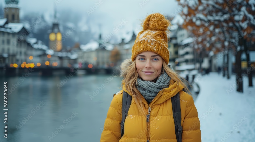 Joyful blonde woman exploring a charming, snowy European town during a picturesque winter vacation, wearing a warm yellow jacket. Joyful blonde woman exploring a charming, snowy European town during a picturesque winter vacation, wearing a warm yellow jacket.