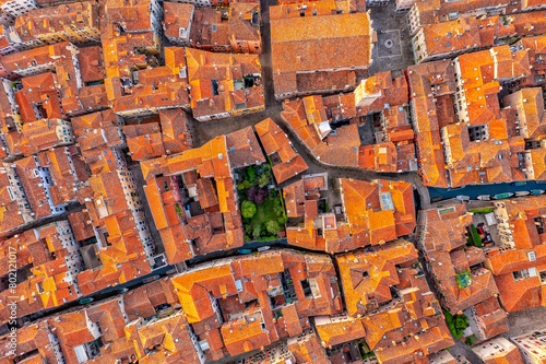 Aerial view of Venice, San Polo, Italy. Amazing city view from above on building roofs and canals.